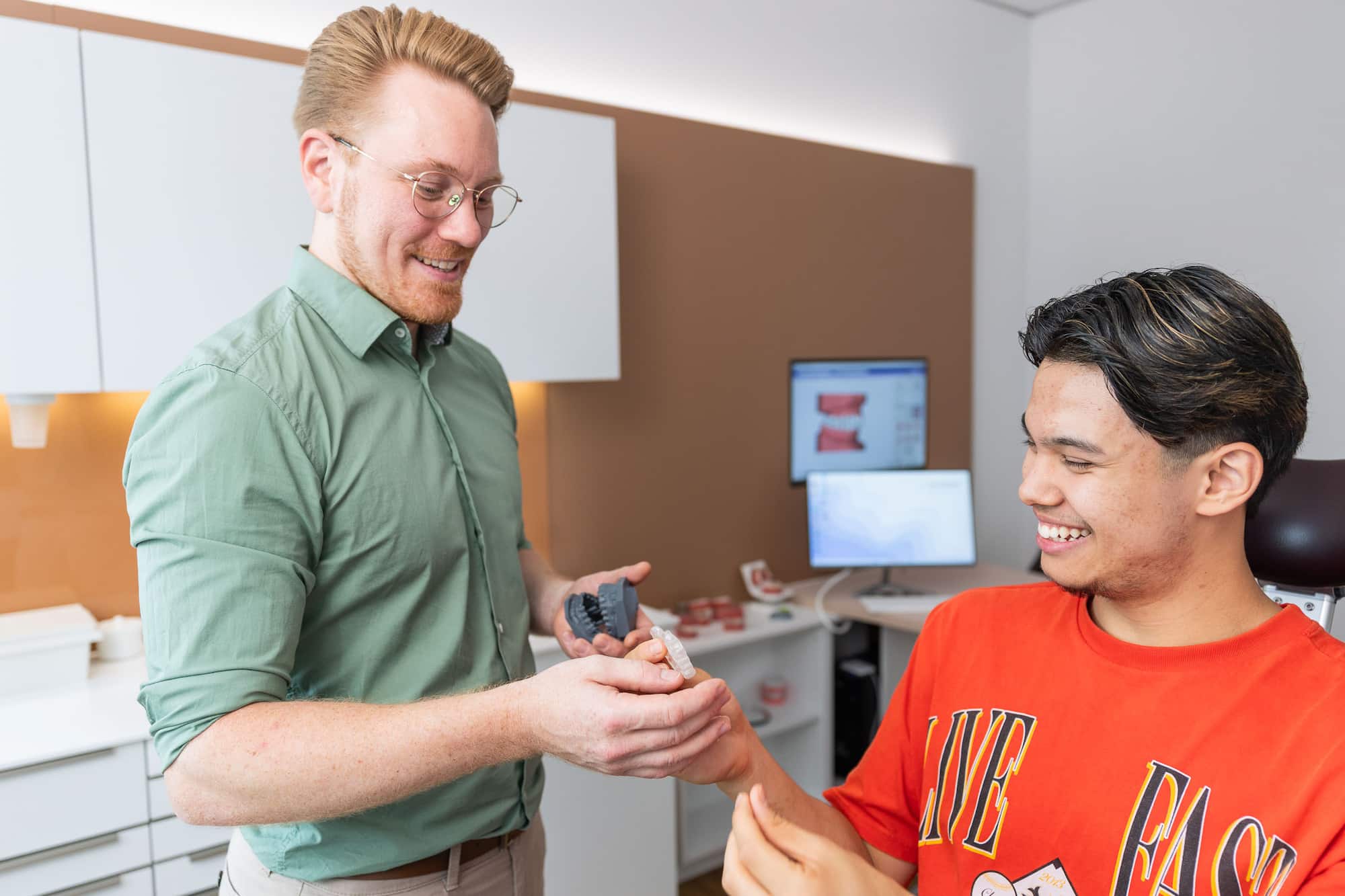 Frankfurt orthodontist shows custom-made sports mouthguards at Skyline Orthodontics